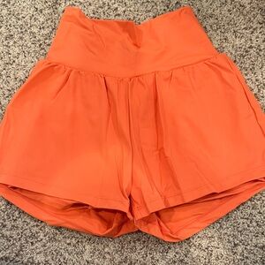 Women’s orange athletic shorts